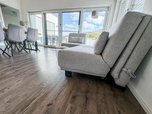 Ruang duduk di Wunderschöne helle Wohnung mit großer Dachterrasse