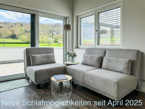 Ruang duduk di Wunderschöne helle Wohnung mit großer Dachterrasse