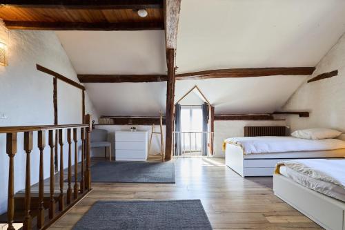 Postel nebo postele na pokoji v ubytování Gîte 6 chambres entre Reims et Epernay - Le Tilleul - Gîtes Au Beau Sarrazin