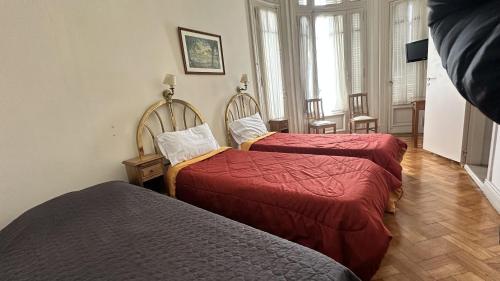 Ένα ή περισσότερα κρεβάτια σε δωμάτιο στο Residencia AMFE