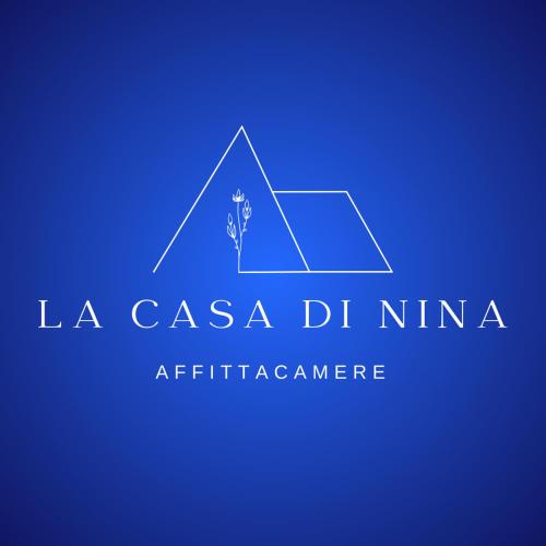 a logo with a tree in the middle of a pyramid at La Casa di Nina in Castelnuovo Cilento