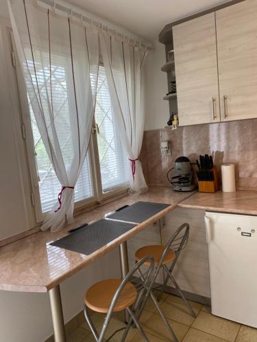 Nhà bếp/bếp nhỏ tại Gréta apartman