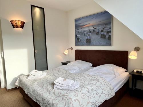 Ένα ή περισσότερα κρεβάτια σε δωμάτιο στο Appartementhaus Seemöwe Eismöwe