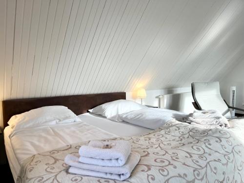 Ένα ή περισσότερα κρεβάτια σε δωμάτιο στο Appartementhaus Seemöwe Rosenmöwe