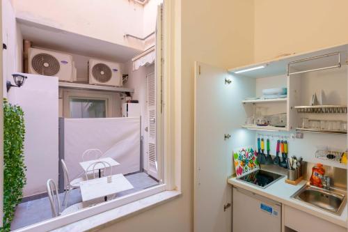 Η κουζίνα ή μικρή κουζίνα στο Suite nel Largo