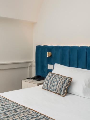 Hotel Michelangeloにあるベッド