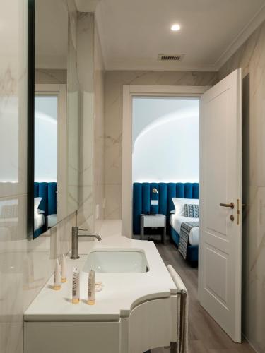Hotel Michelangeloにあるバスルーム
