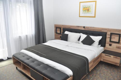Postel nebo postele na pokoji v ubytování Hotel Kühns Mühle