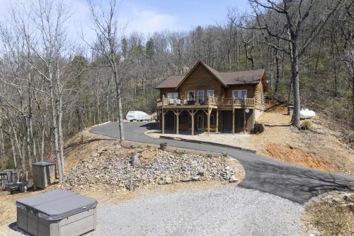 a house on the side of a hill with a road at Echo Mountain in Fairview