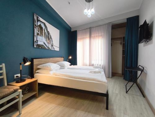 Postel nebo postele na pokoji v ubytování Apart-hotel TARHUN