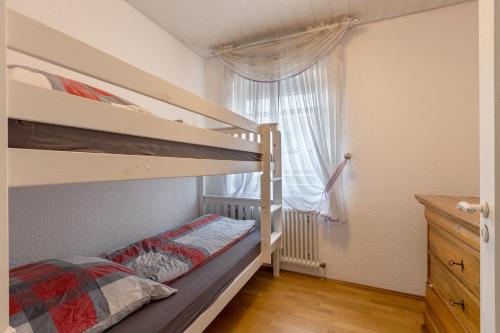 Postel nebo postele na pokoji v ubytování Stricker