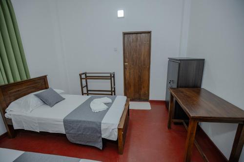 Postel nebo postele na pokoji v ubytování The Urban Stay