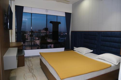 Postel nebo postele na pokoji v ubytování Hotel Top 4