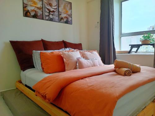 Katil atau katil-katil dalam bilik di Aevia Home Bayview Apartment at PD
