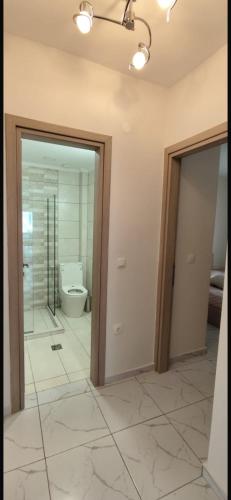 Ванная комната в Luxury Beach Apartment
