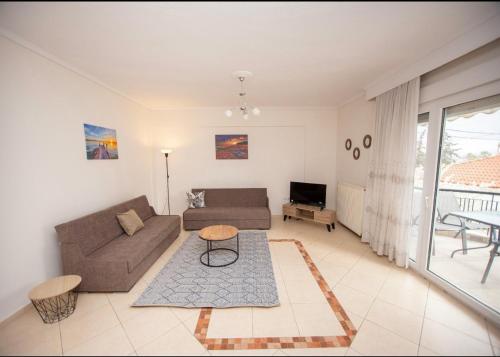 Χώρος καθιστικού στο Boskos Apartments