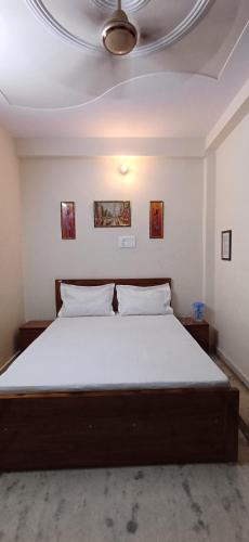 Ένα ή περισσότερα κρεβάτια σε δωμάτιο στο Hotel kusum inn