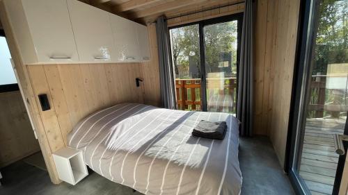 Postel nebo postele na pokoji v ubytování lodge chalet