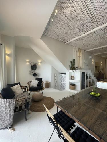 Et opholdsområde på Loft 2 Beachfront Porto Faro