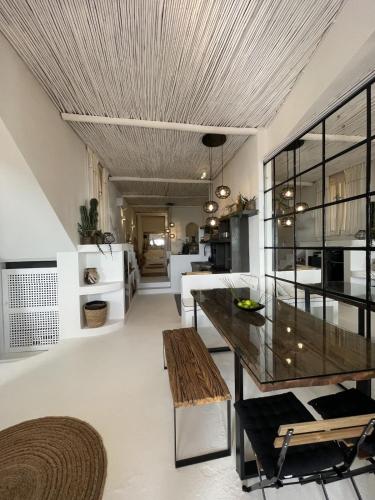 Et opholdsområde på Loft 2 Beachfront Porto Faro