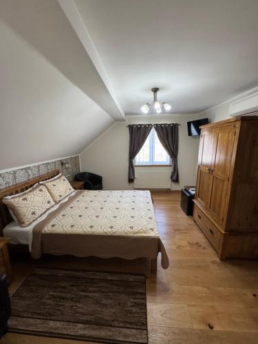 Postel nebo postele na pokoji v ubytování B&B Millenium House