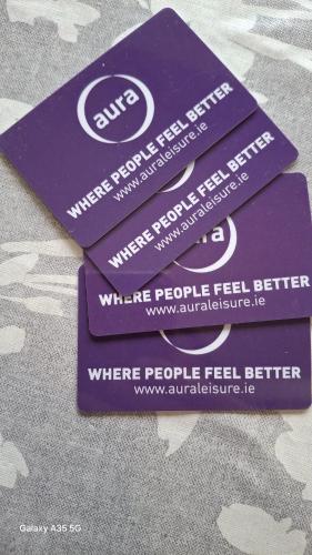 a couple of purple boxes sitting on a table at Artisthostel Letterkenny in Letterkenny