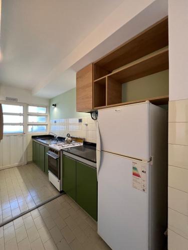 Una cocina o cocineta en Apart ESPAÑA