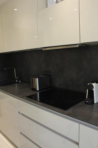 A cozinha ou cozinha compacta de Villa Stella-Jacuzzi, Piscine, Calme-Parking