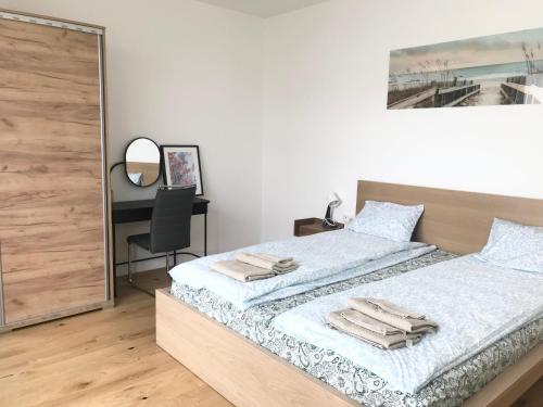 Postel nebo postele na pokoji v ubytování apartmánplus02