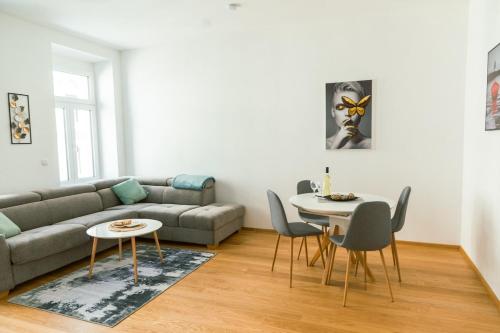 Posezení v ubytování New Design Apartment 9