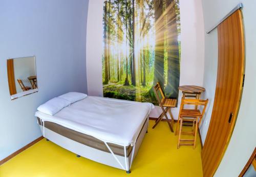 Postel nebo postele na pokoji v ubytování Recanto Berlin