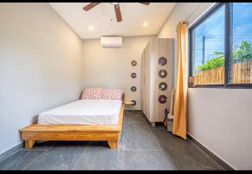 Postel nebo postele na pokoji v ubytování Villa Paradise