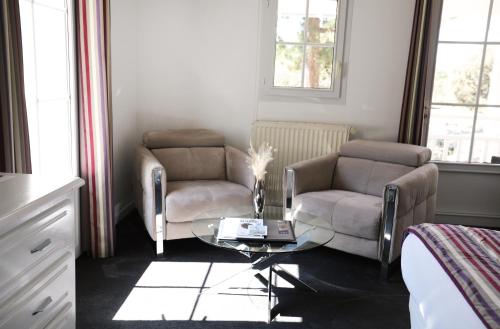 Posezení v ubytování Hôtel Les Prateaux