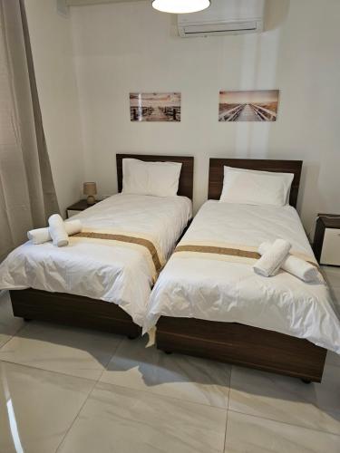 Cama o camas de una habitación en Seaberry Park, Block A, Apartment 203, Triq it-Tamar, St Paul's Bay, Malta