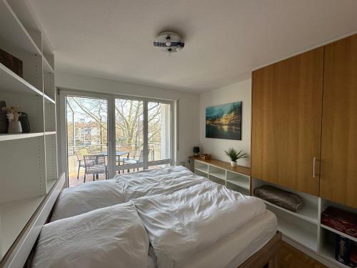 Ένα ή περισσότερα κρεβάτια σε δωμάτιο στο Wohnung am Neckar mit Tiefgarage