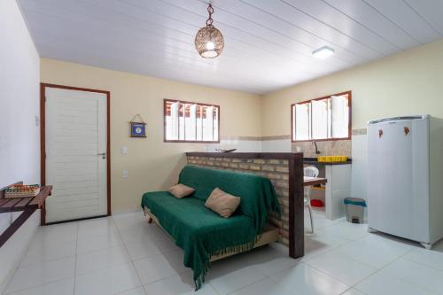 Kuchyň nebo kuchyňský kout v ubytování Vila das Cores Praia
