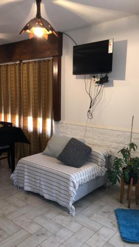 Giường trong phòng chung tại Departamento la Oma