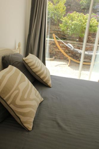 Cama ou camas em um quarto em Villa Stella-Jacuzzi, Piscine, Calme-Parking