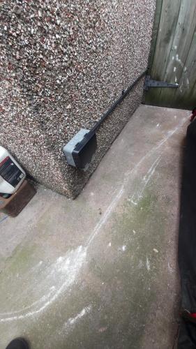 a black object sitting on the side of a building at Phoenix Nights Guest House in Barrow in Furness