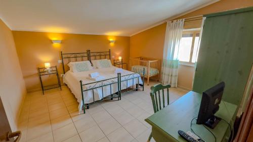 Cama o camas de una habitación en Su Recreu 'E Mare