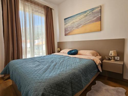 Llit o llits en una habitació de Zen Apartment