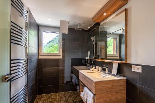 Koupelna v ubytování Naco Aparthotel by Arca Spa