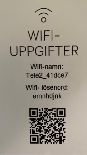 a sign that reads wifi interpreter with name at Nära till allt, i delad lägenhet in Ystad