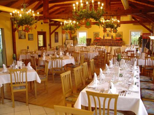 ห้องอาหารหรือที่รับประทานอาหารของ Kogler’s Pfeffermühle Hotel & Restaurant