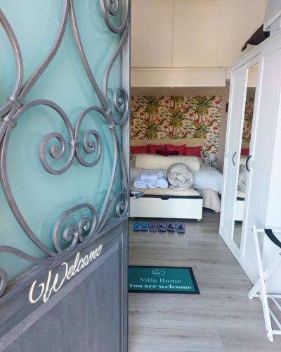 a small room with a bed in the background at ViDa Home in Castelmola