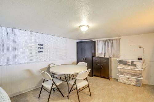 a dining room with a table and chairs at Walk to Beaches Waterfront Home in Port Orchard! in Port Orchard