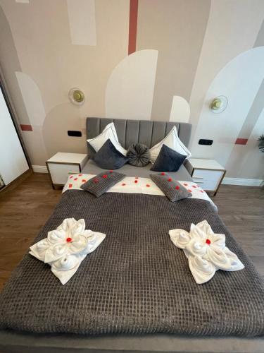 Ένα ή περισσότερα κρεβάτια σε δωμάτιο στο Luxuroom