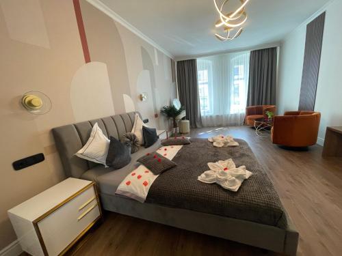 Ένα ή περισσότερα κρεβάτια σε δωμάτιο στο Luxuroom