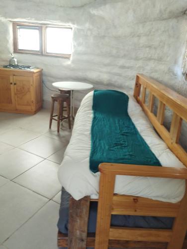 Postel nebo postele na pokoji v ubytování Ecodomos La Tongoycilla