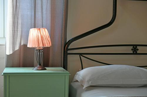 Katil atau katil-katil dalam bilik di Athina Guesthouse